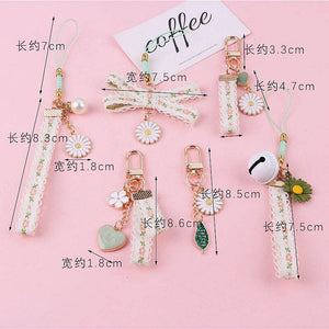 Ins Small Daisy Flower Keychain For Women Bell Ribbon Key Ring Bag Ornaments Airpods Pendent Charm Accessories