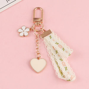 Ins Small Daisy Flower Keychain For Women Bell Ribbon Key Ring Bag Ornaments Airpods Pendent Charm Accessories